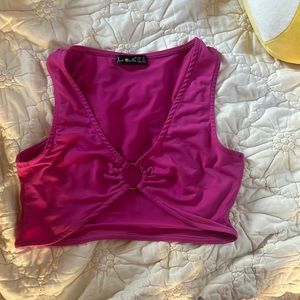 Pink top with gold hoop in middle